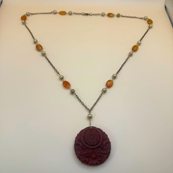 Unbranded Jewelry - Vintage 32” Bronze Gold Tone Necklace Carved Brown Resin Pendant Asian Motif